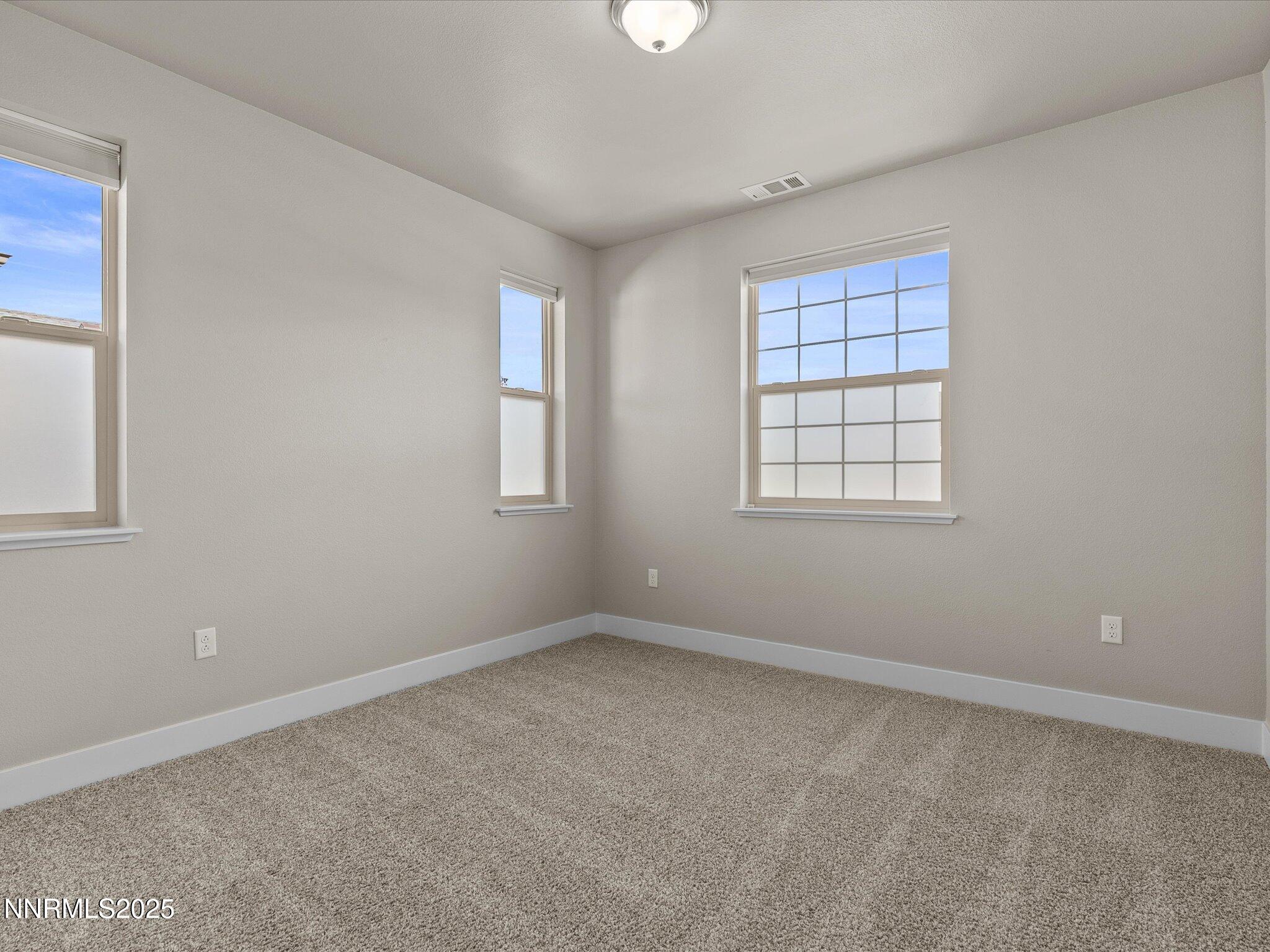 770 East Cottage Loop Gardnerville, NV 89460 - Photo 30 of 38 an empty room with windows