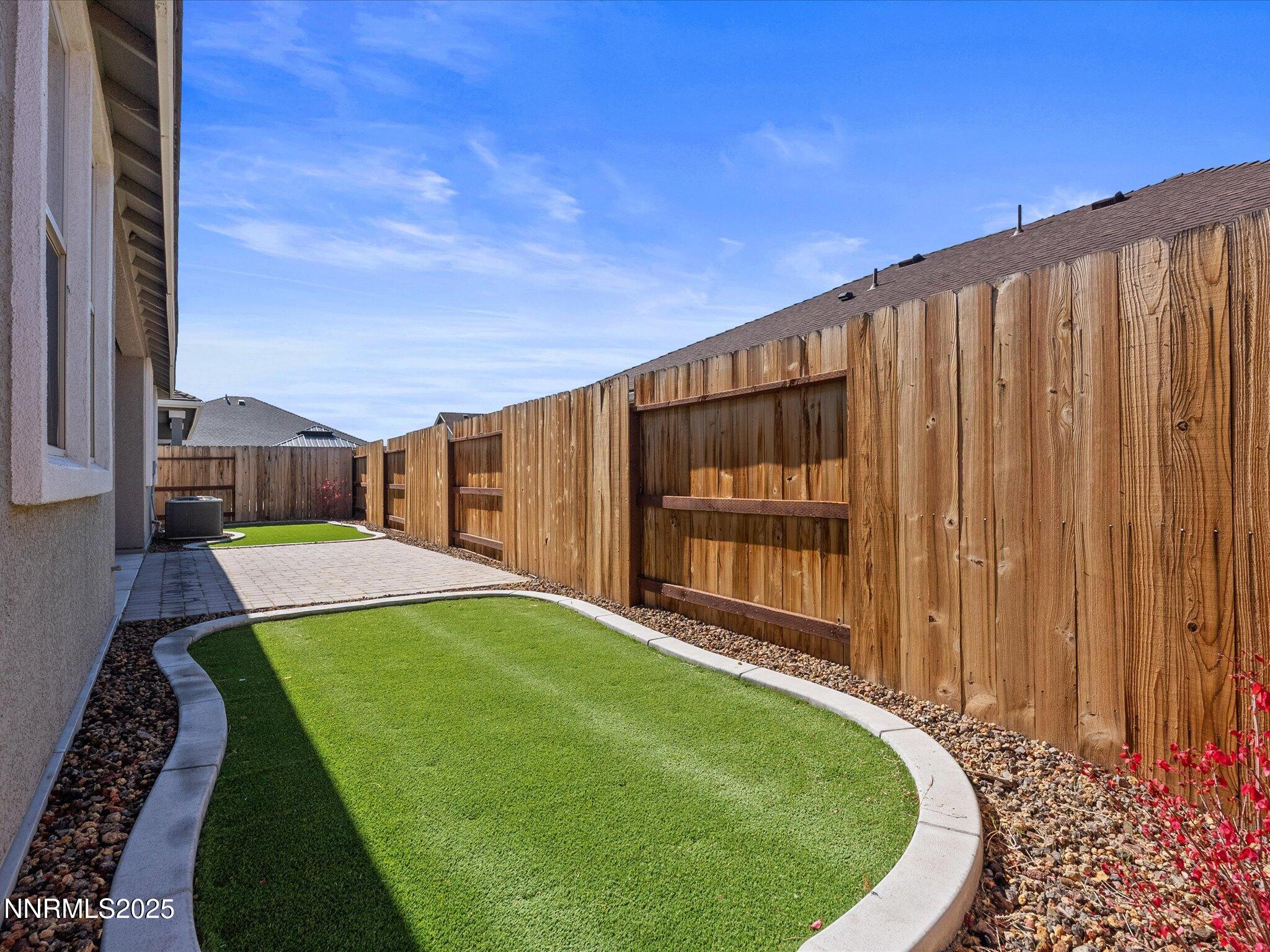 770 East Cottage Loop Gardnerville, NV 89460 - Photo 36 of 38 a view of a backyard with sitting area