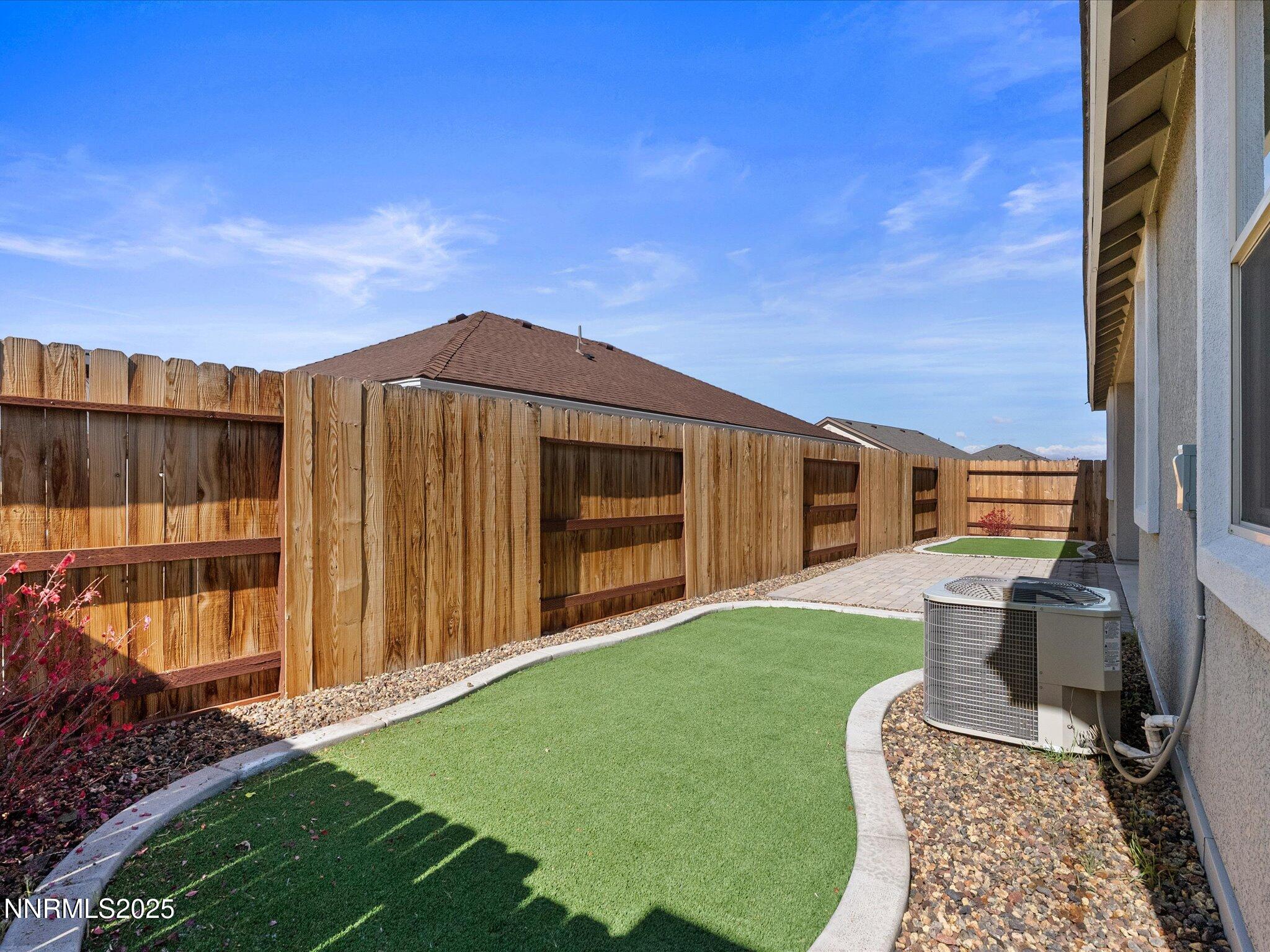 770 East Cottage Loop Gardnerville, NV 89460 - Photo 38 of 38 a view of a house with backyard porch and sitting area