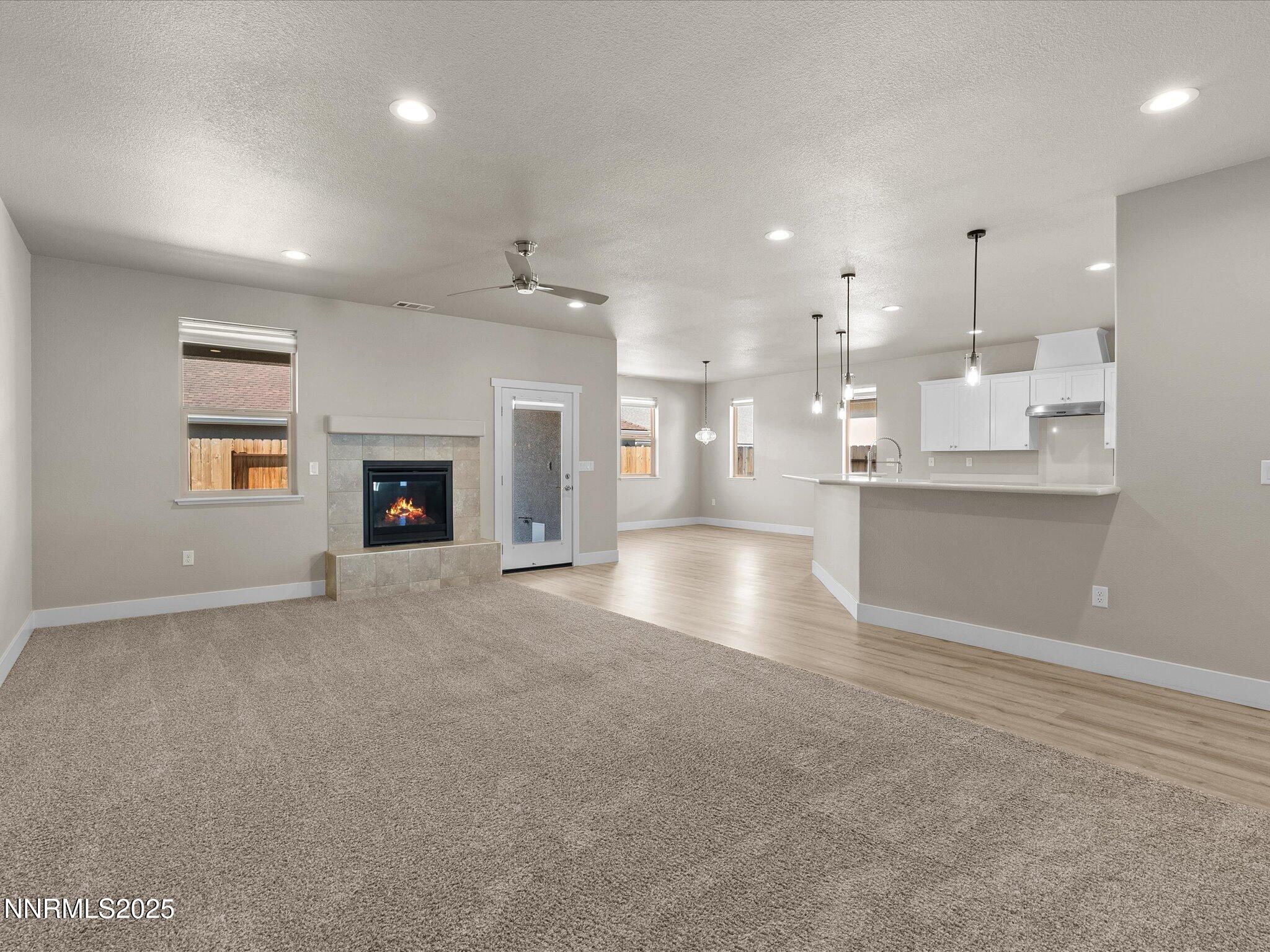 770 East Cottage Loop Gardnerville, NV 89460 - Photo 7 of 38 a view of a kitchen and kitchen with a sink