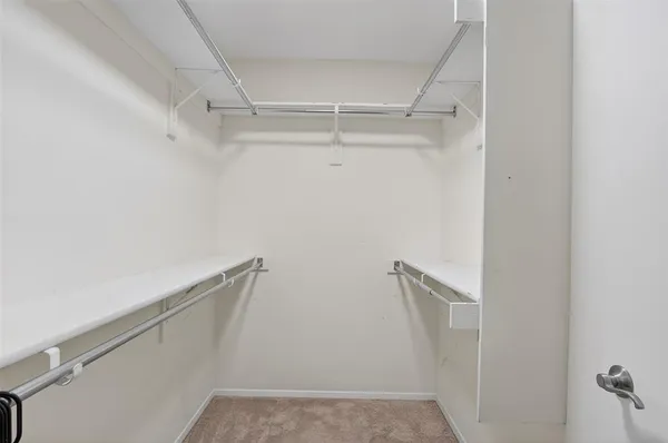 a bathroom with a sink vanity and a mirror