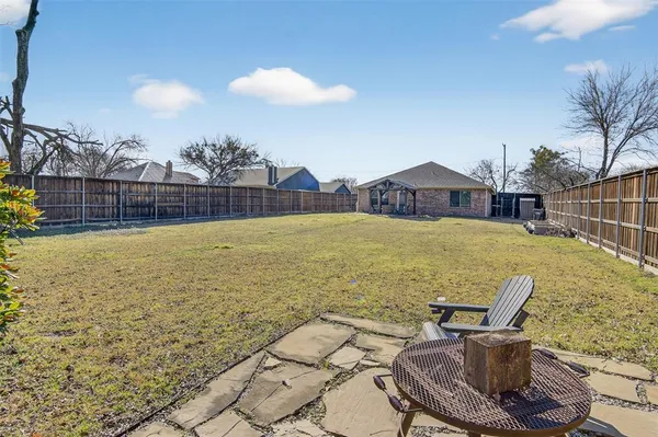a view of a swimming pool with lounge chair