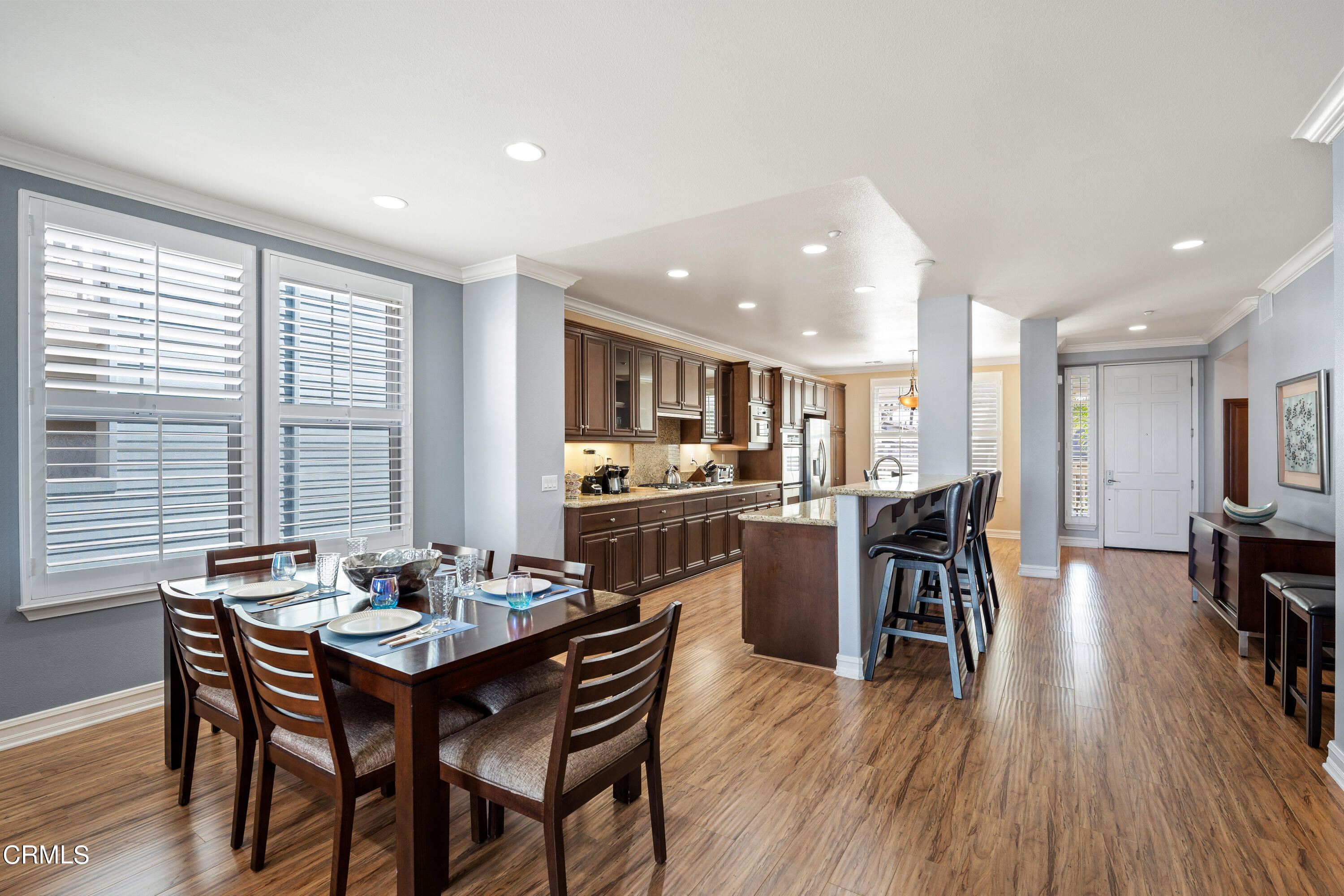 1541 Windshore Way Oxnard, CA 93035 - Photo 12 of 40 a dining room with furniture and wooden floor