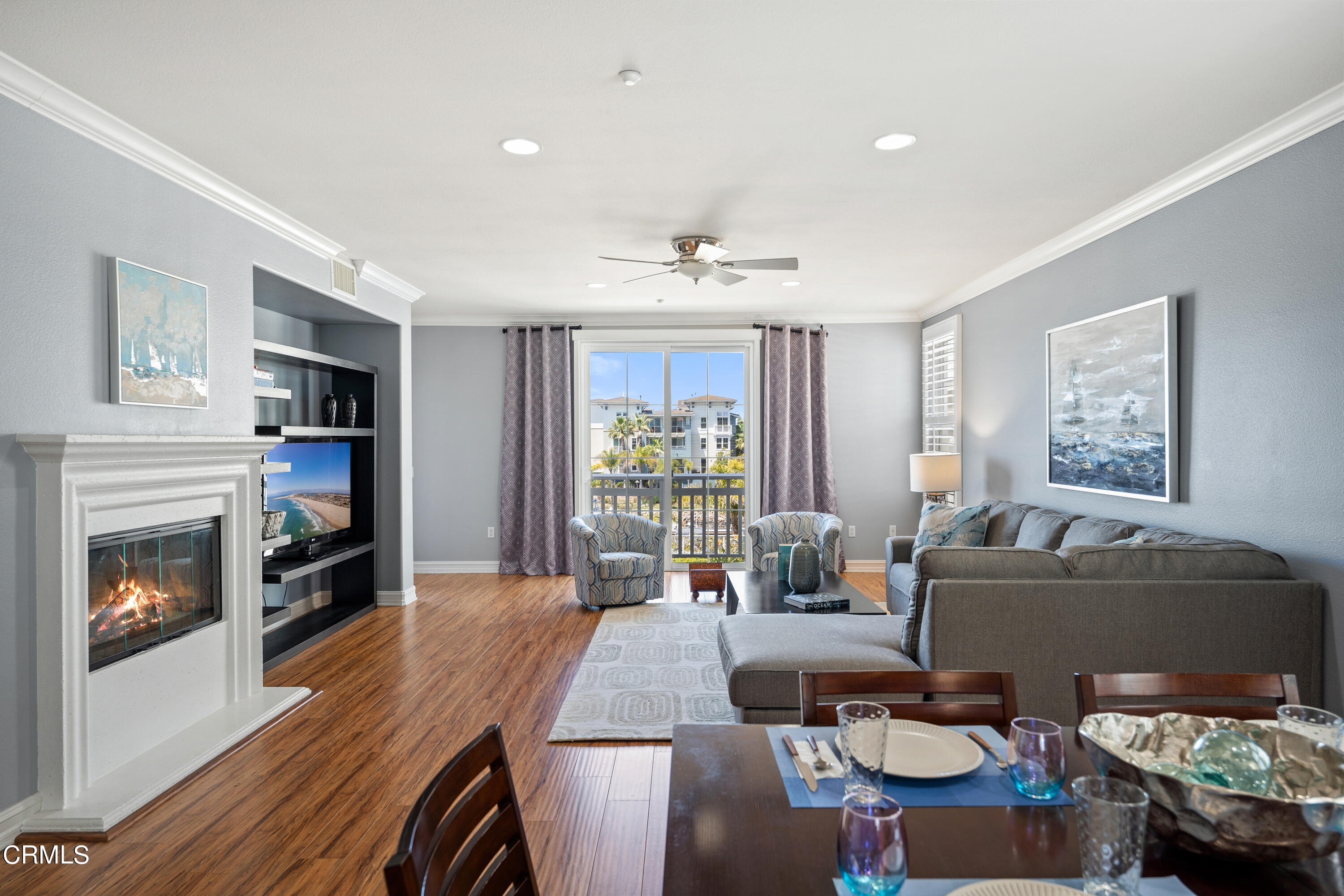 1541 Windshore Way Oxnard, CA 93035 - Photo 13 of 40 a living room with furniture and a fireplace