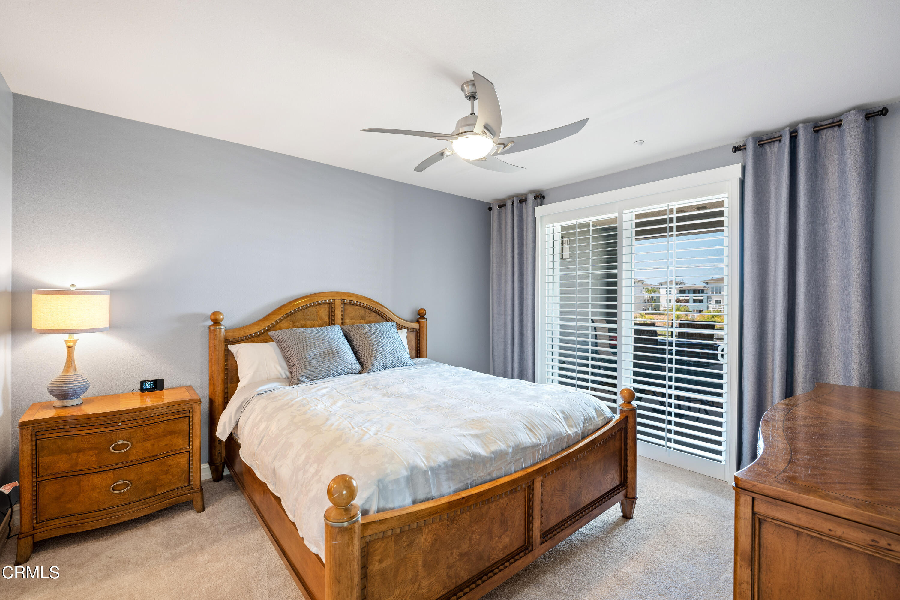 1541 Windshore Way Oxnard, CA 93035 - Photo 22 of 40 a bedroom with a bed and a dresser