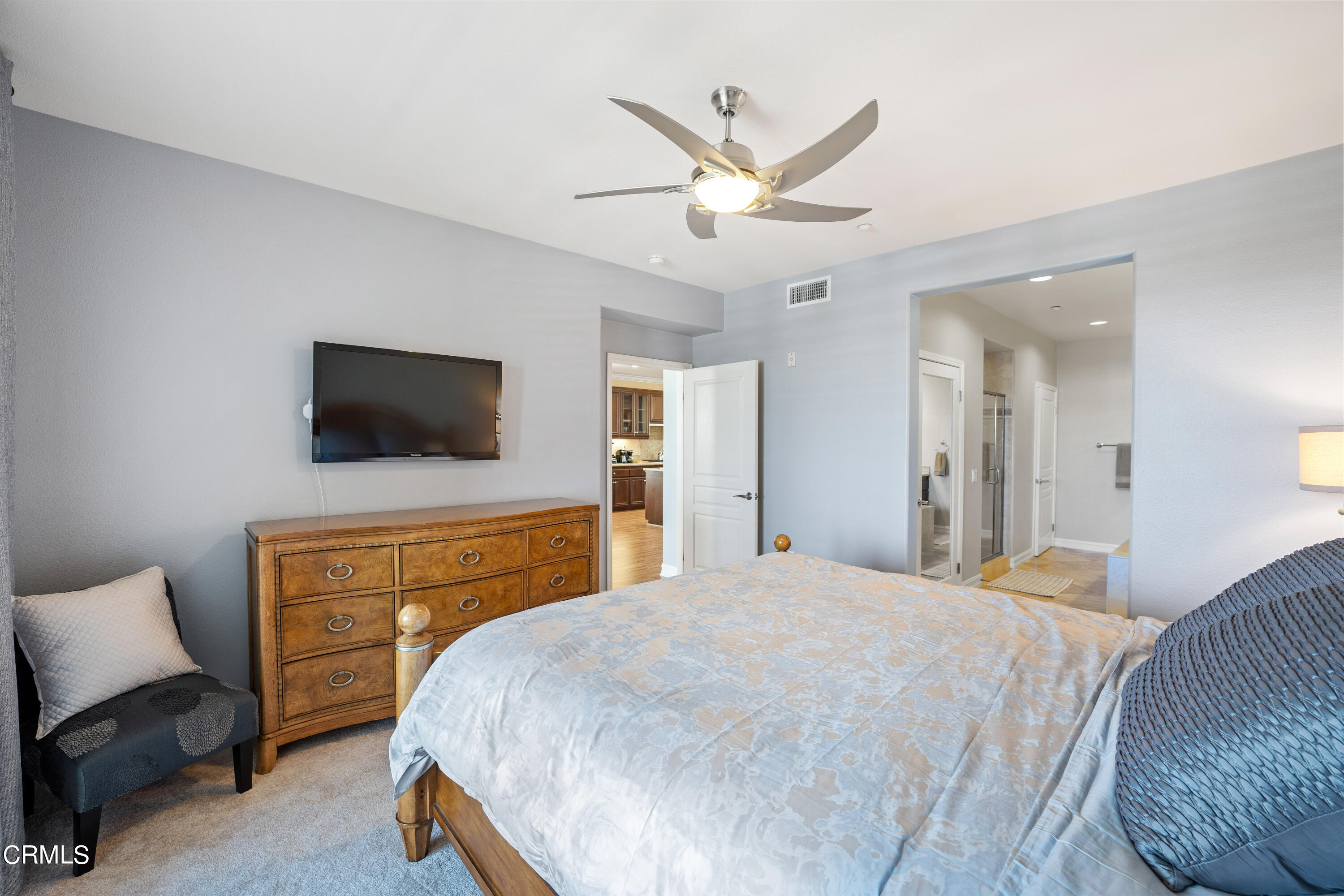 1541 Windshore Way Oxnard, CA 93035 - Photo 23 of 40 a bedroom with a bed and a flat screen tv