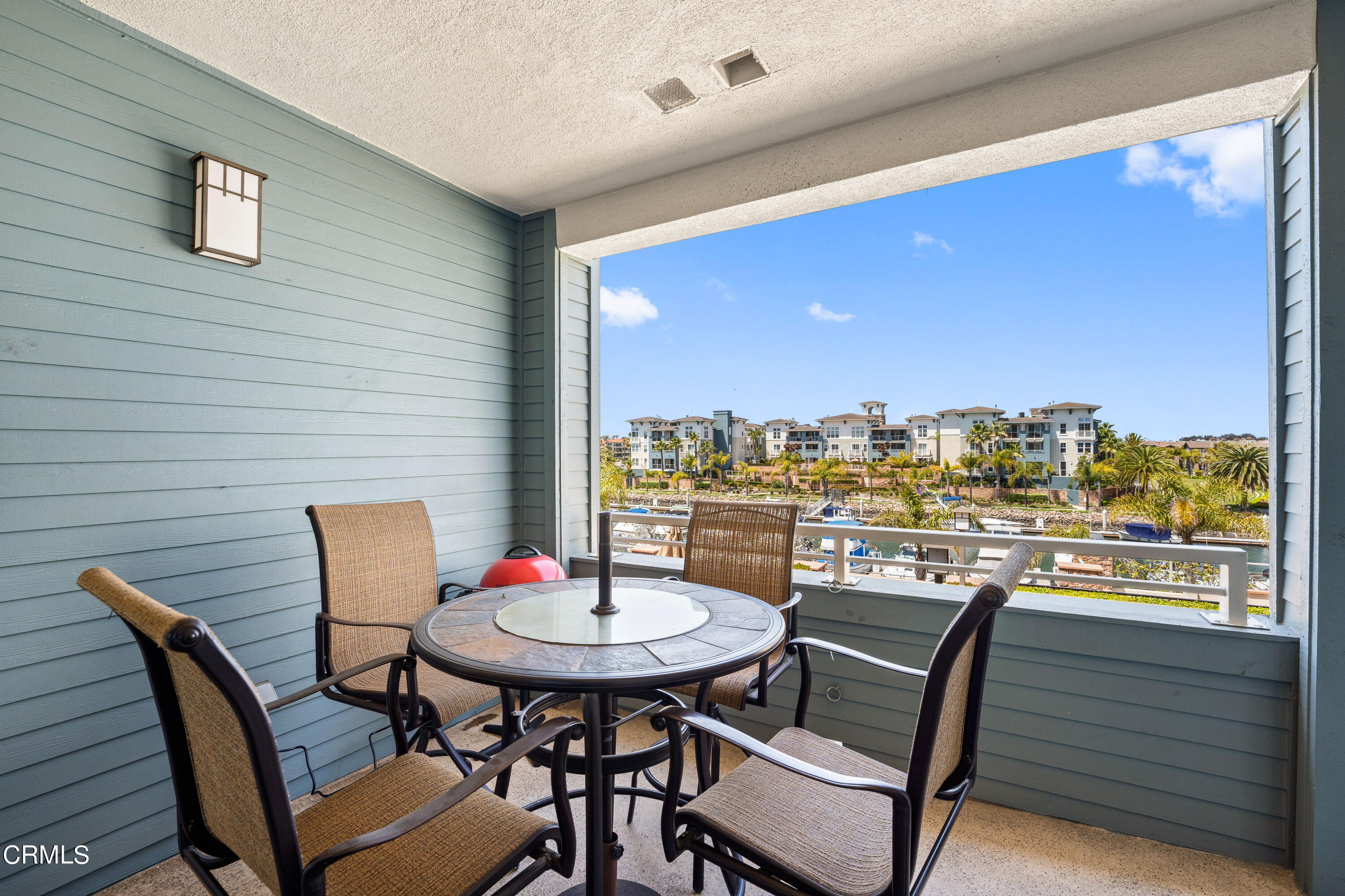 1541 Windshore Way Oxnard, CA 93035 - Photo 26 of 40 a table and chairs in front of a window