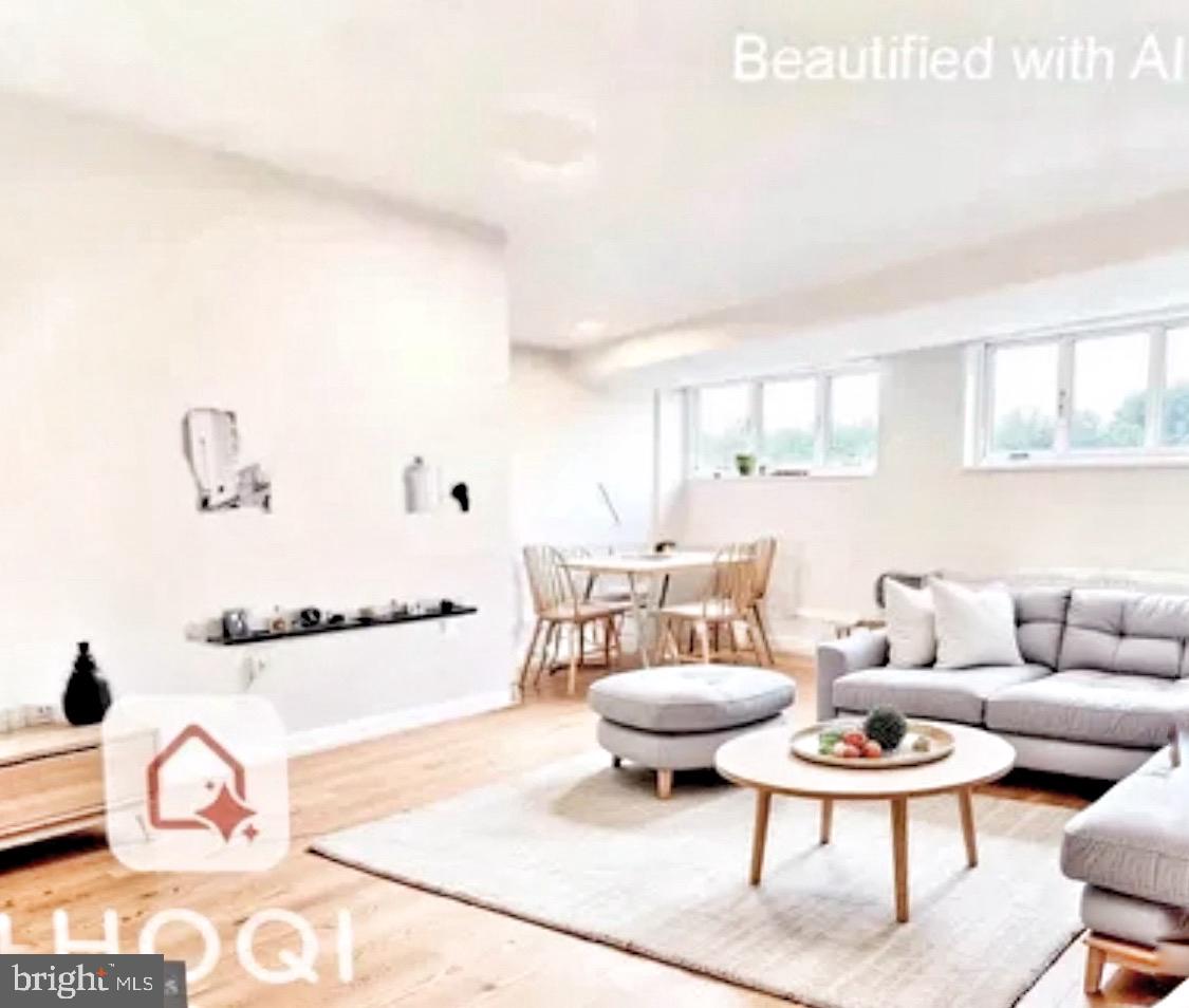 2400 41st Street Northwest, Unit 104 Washington, DC 20007 - Photo 18 of 25 Living room Rendering