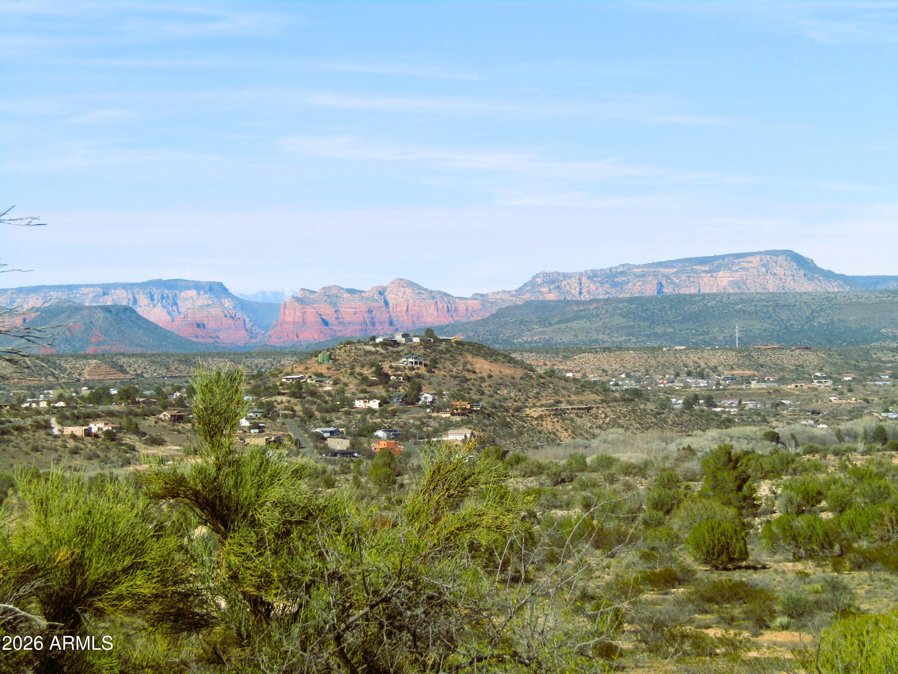 a view of a city with mountains in the background