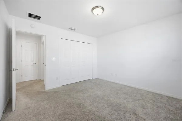 an empty room with an entryway