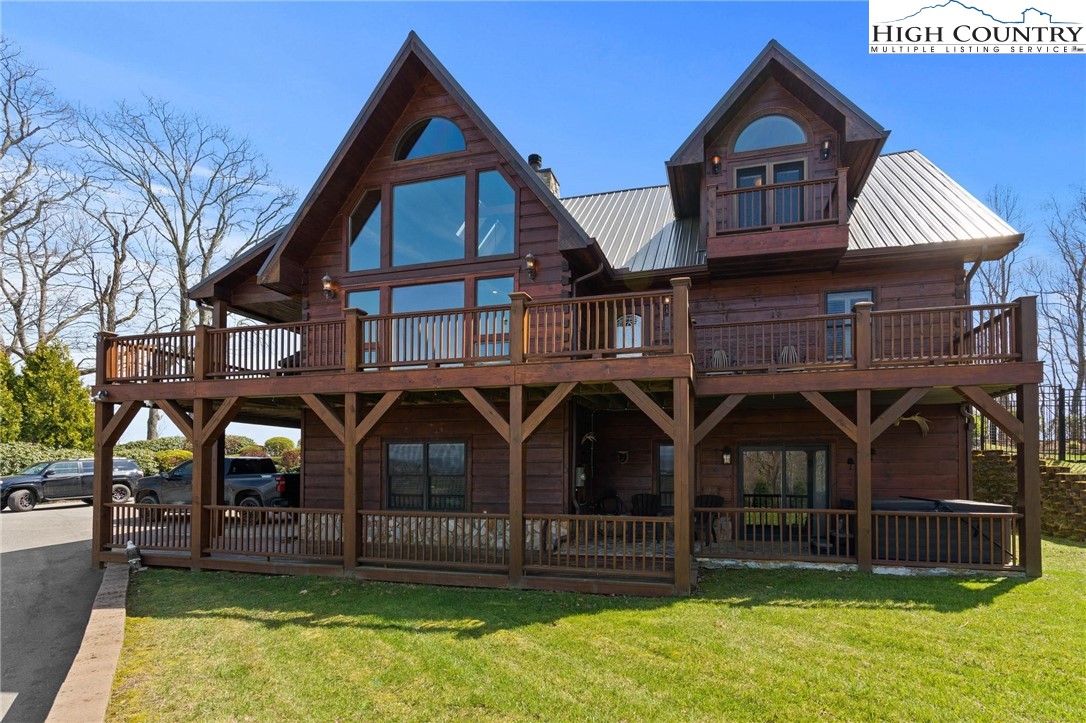 184 Avalanche Trail Boone, NC 28607 - Photo 2 of 46 a front view of a house with swimming pool