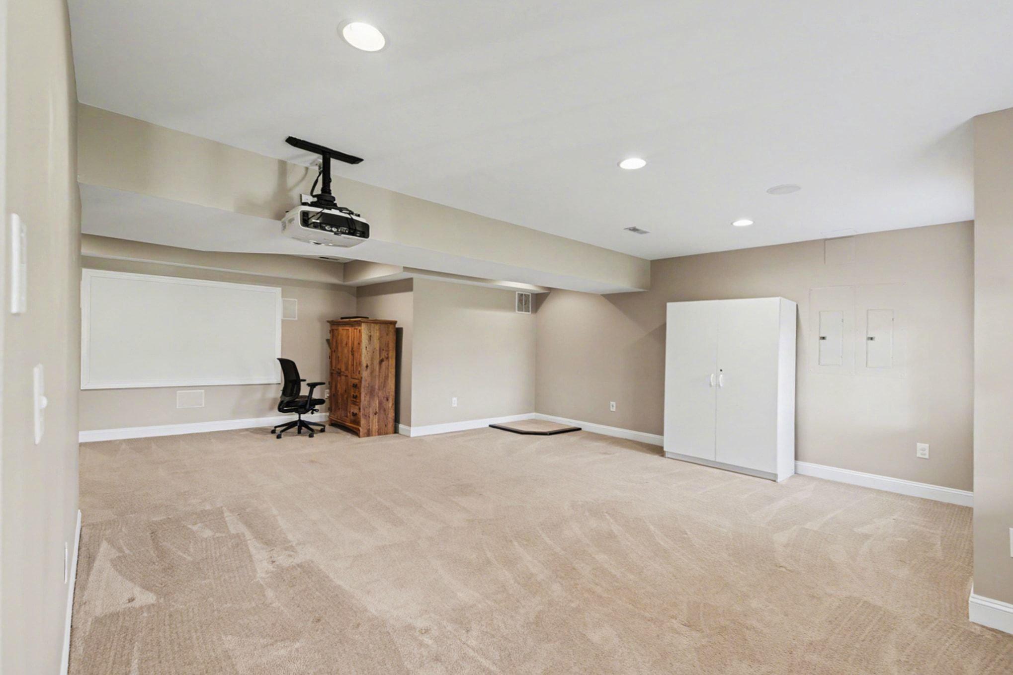 1105 Brehm Road Westminster, MD 21157 - Photo 40 of 56 Lower Level Family Room w/Projector & Screen