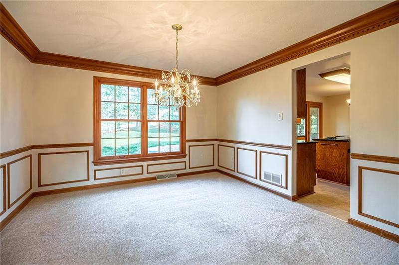 2536 Riva Ridge Court Wexford, PA 15090 - Photo 12 of 25 Lovely extra trim details are found in this spacious dining room with dentil crown molding, chair rail, and a sparkling light fixture!