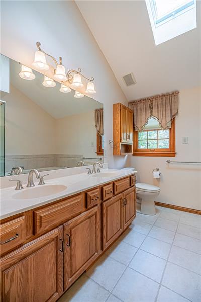2536 Riva Ridge Court Wexford, PA 15090 - Photo 15 of 25 The master bathroom had a facelift in 2008 with a complete new design that features a dual vanity, soft close elevated toilet seat, and tiled-in shower, and an amazing 2 person jacuzzi tub!