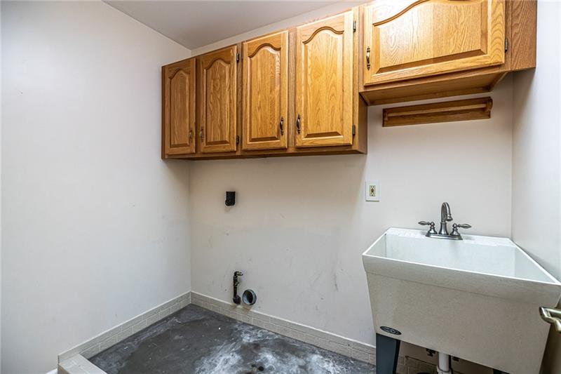 2536 Riva Ridge Court Wexford, PA 15090 - Photo 21 of 25 Once you have used a 2nd floor laundry you will never want another home without one! But this is not a tiny little hall unit like track builders install - this is a full size laundry with tub & built-in cabinets!