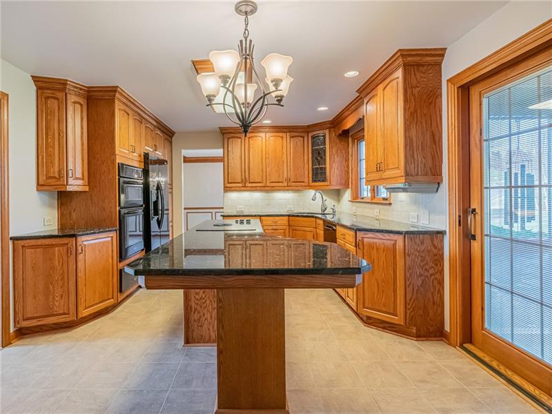 2536 Riva Ridge Court Wexford, PA 15090 - Photo 23 of 25 With the oversized kitchen cabinets and the spacious granite countertop space, you will love the design of this kitchen! Plenty of space for 4 or 5 bar stool seats to gather in this bright space!