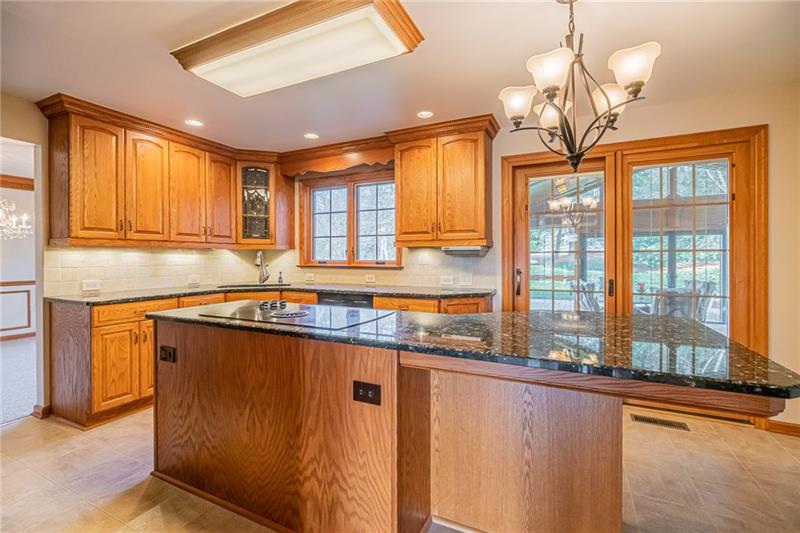 2536 Riva Ridge Court Wexford, PA 15090 - Photo 6 of 25 The kitchen was fully remodeled in 2011 with granite countertops, new appliances, tile backsplash, custom cabinets with soft close drawers, double ovens and warming tray as well!!