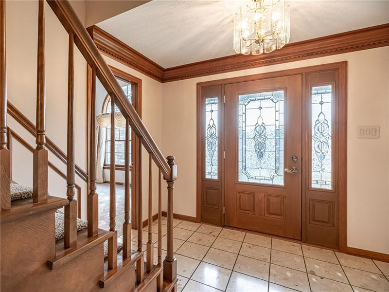 2536 Riva Ridge Court Wexford, PA 15090 - Photo 9 of 25 Dentil crown molding and the updated high end Pella front door highlight some of the custom, remarkable features of this quality built home!