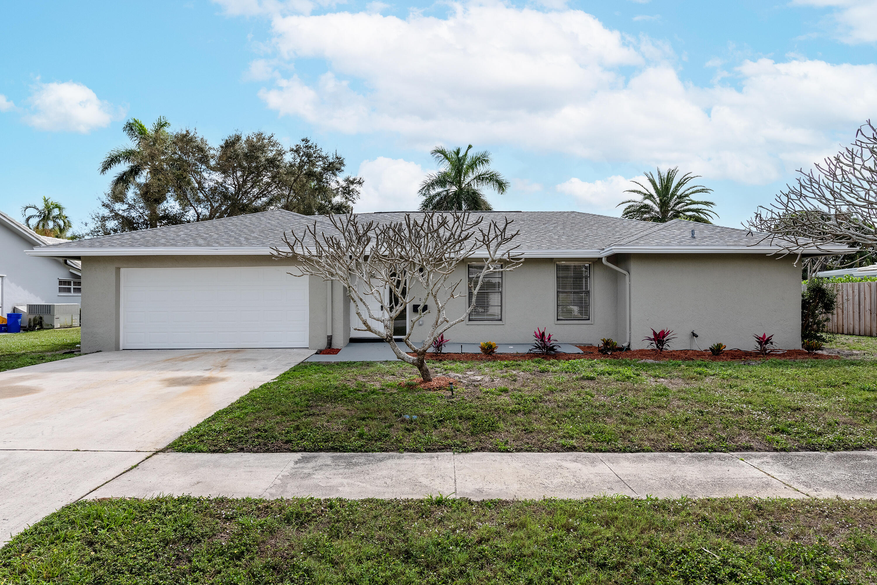 1492 Southwest 13th Drive Boca Raton, FL 33486 - Photo 1 of 54 1492SW13thDriveBocaRaton-74
