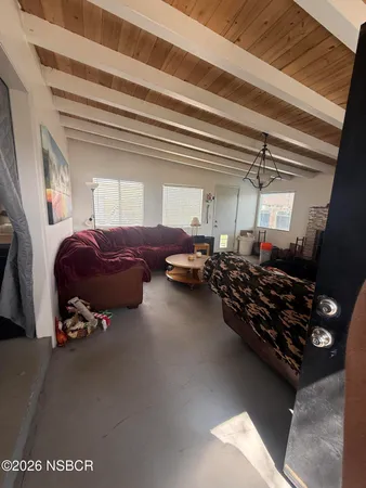 a room with lots of cars parked in it