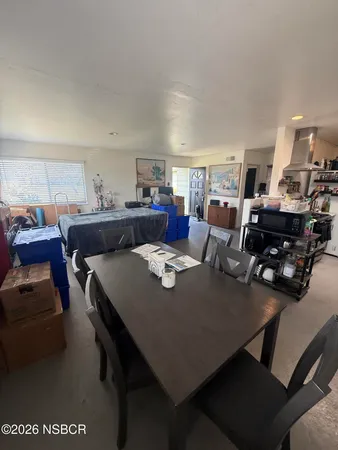 a view of a dining room with furniture