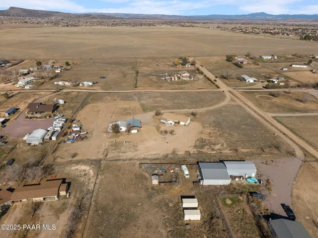 an aerial view of a city with ocean view