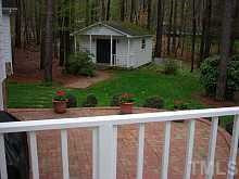 10700 Marthas Way Raleigh, NC 27615 - Photo 7 of 12 Even your wired workshop/storage shed is picturesque, adding to the charm of your backyard. Other