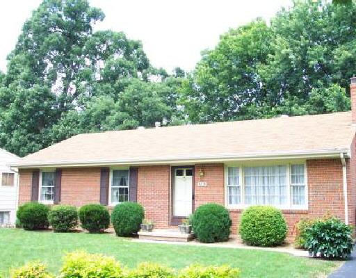 5319 Twilight Road Roanoke, VA 24019 - Photo 1 of 1 a front view of a house with a yard and trees