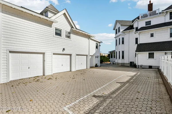 a view of a house with a parking area