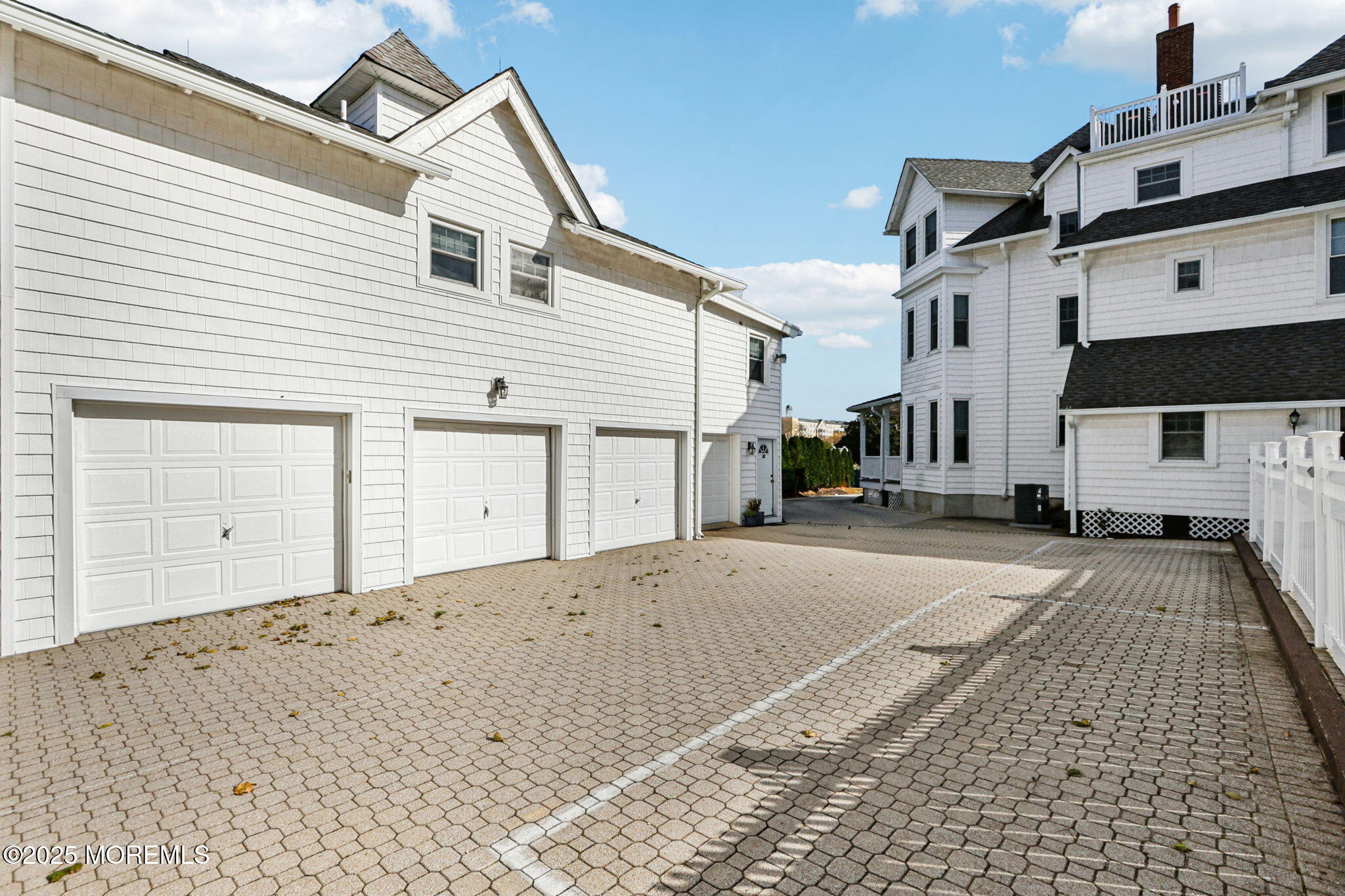 200 Monmouth Avenue, Unit 19 Spring Lake, NJ 07762 - Photo 14 of 28 a view of a house with a parking area
