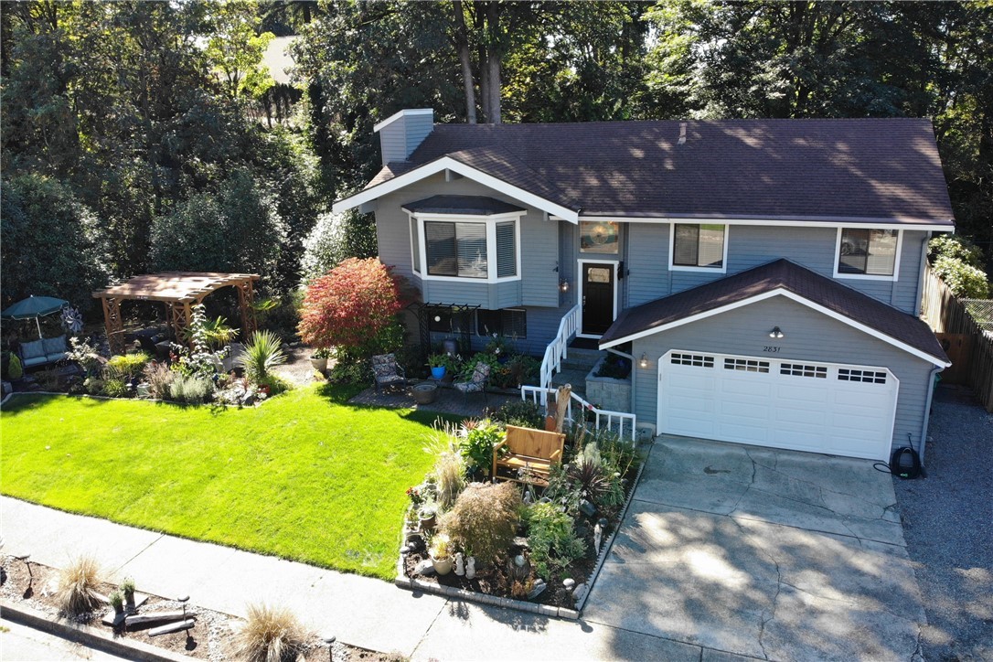 2831 Whitworth Avenue South Renton, WA 98055 - Photo 2 of 40 a front view of a house with a yard
