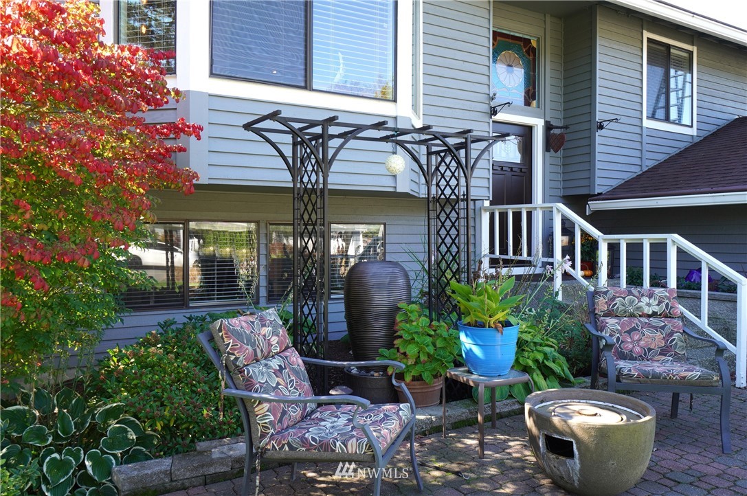 2831 Whitworth Avenue South Renton, WA 98055 - Photo 3 of 40 a view of a chair and table in backyard of the house