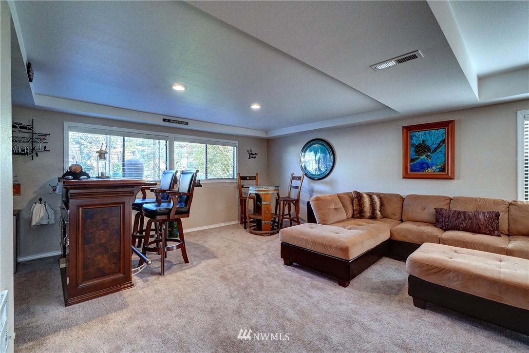 2831 Whitworth Avenue South Renton, WA 98055 - Photo 25 of 40 a living room with furniture and a large window