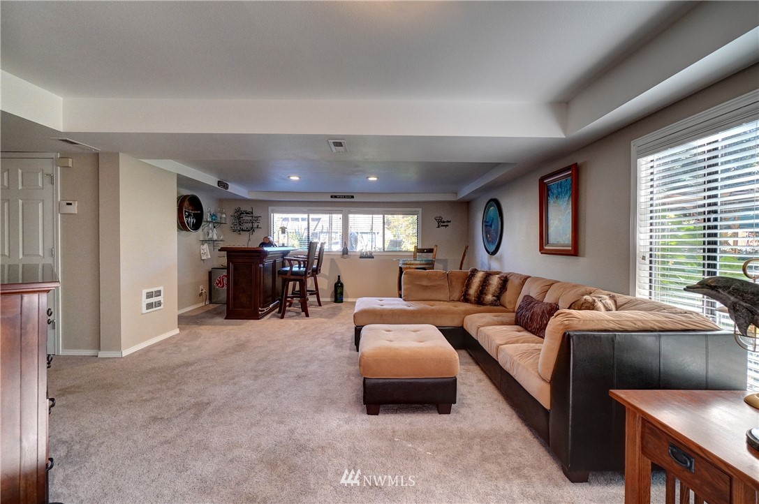 2831 Whitworth Avenue South Renton, WA 98055 - Photo 28 of 40 a living room with furniture and a large window