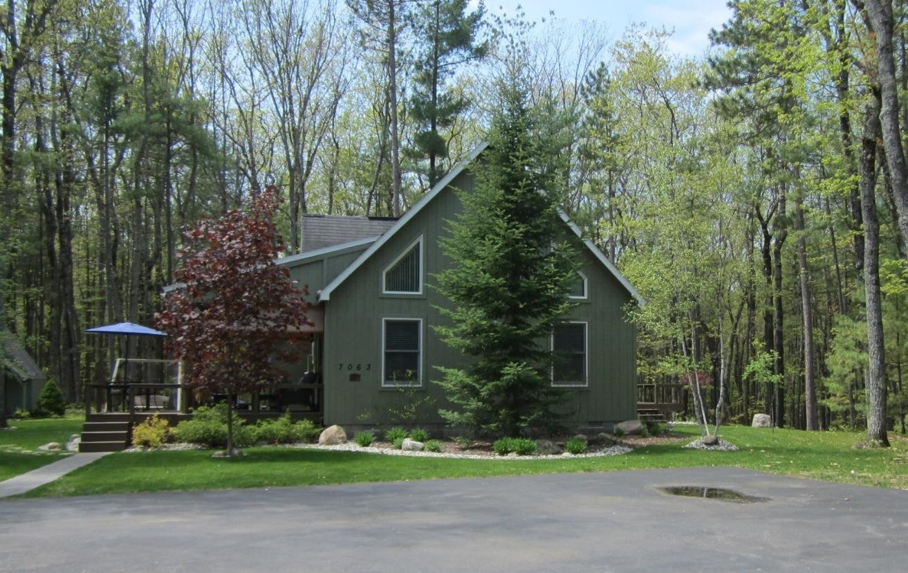 7063 Frontenac Road Indian River, MI 49749 - Photo 1 of 36 Photo 1