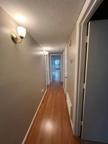 a view of a deck with a yard