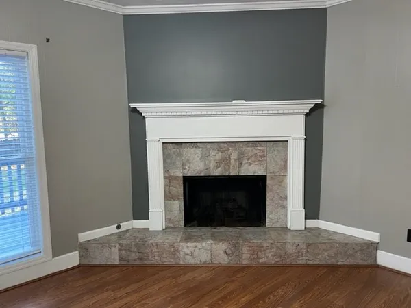 a living room with a fireplace