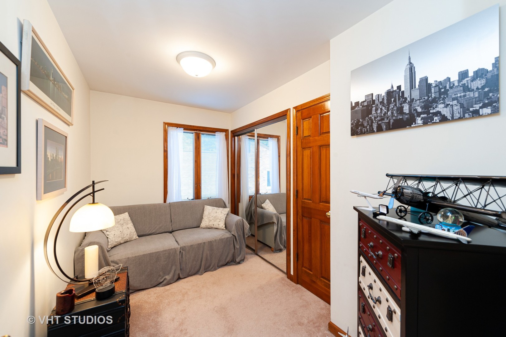 227 Perth Road Cary, IL 60013 - Photo 16 of 19 a bedroom with furniture and a floor to ceiling window