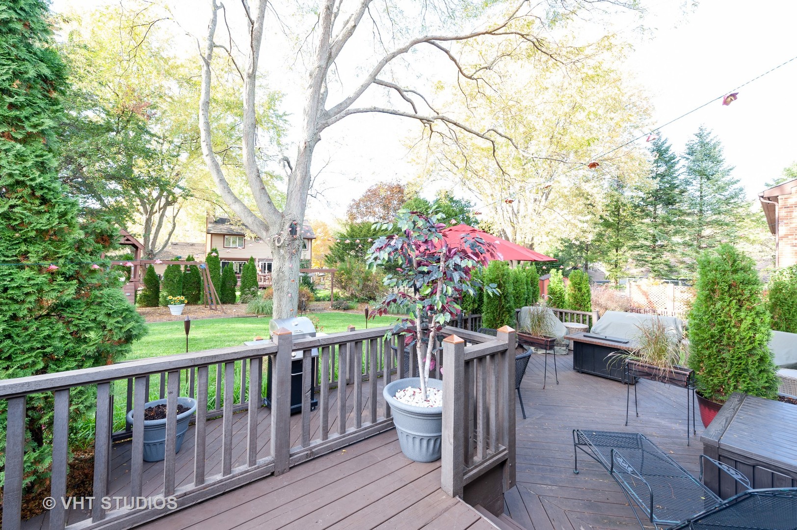 227 Perth Road Cary, IL 60013 - Photo 18 of 19 a view of a deck with furniture and garden