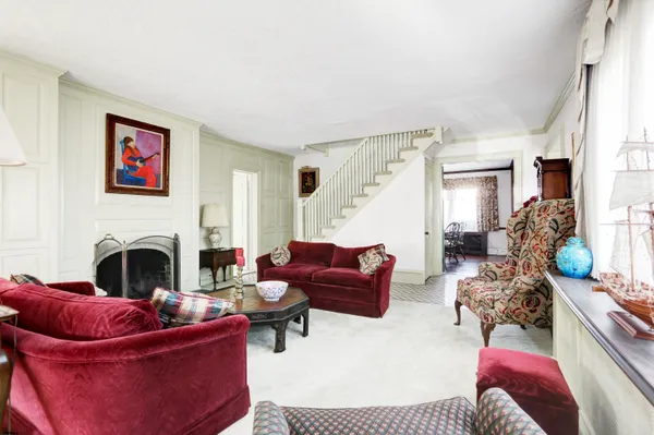 a living room with furniture or couch and a fireplace