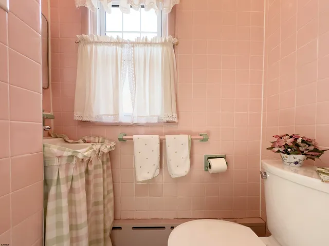 a bathroom with a sink and a toilet