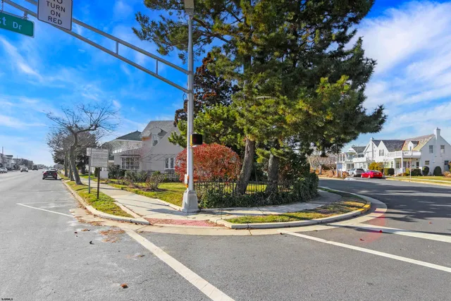 a view of street with houses
