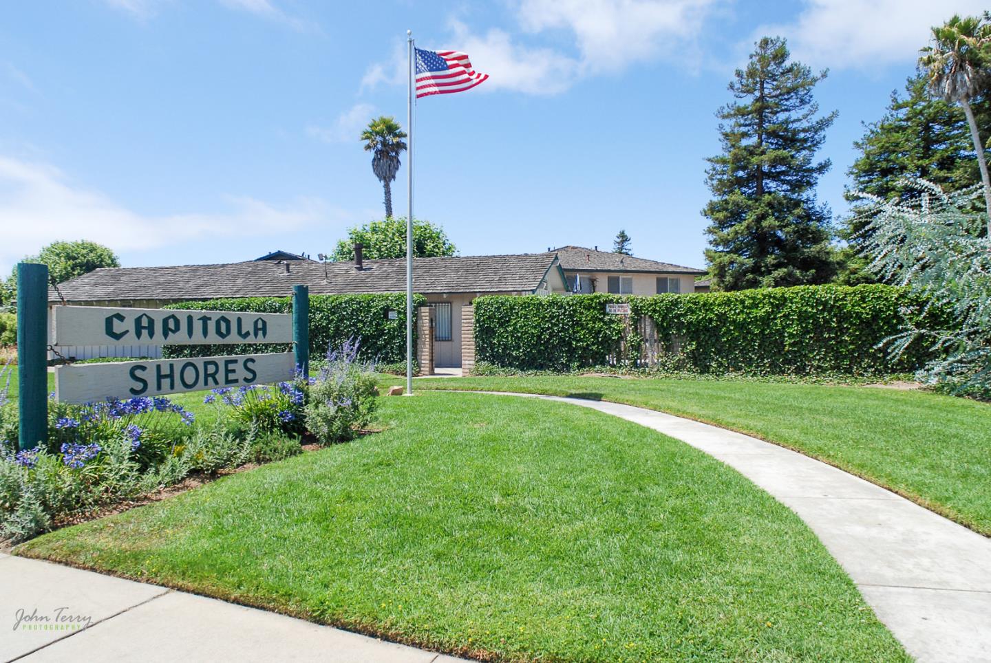 1375 Ruby Court, Unit 4 Capitola, CA 95010 - Photo 15 of 15 a view of a house with a yard and potted plants