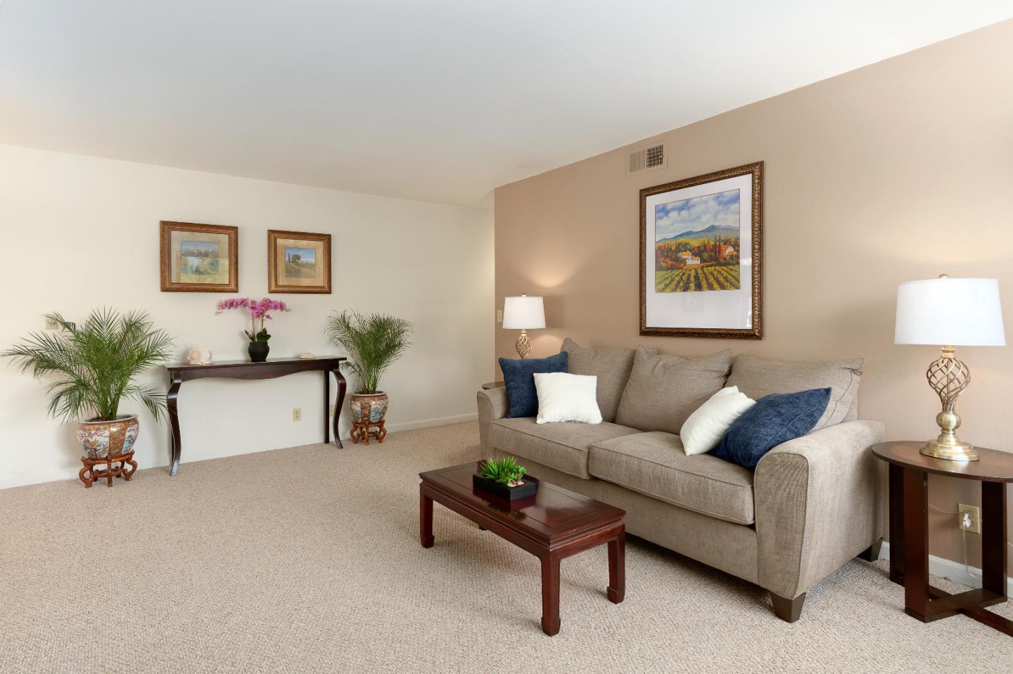 1375 Ruby Court, Unit 4 Capitola, CA 95010 - Photo 4 of 15 a living room with furniture and a potted plant