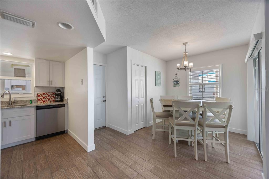 6150 Midnight Pass Road, Unit 10 A&B Sarasota, FL 34242 - Photo 16 of 65 a view of a kitchen and dining room