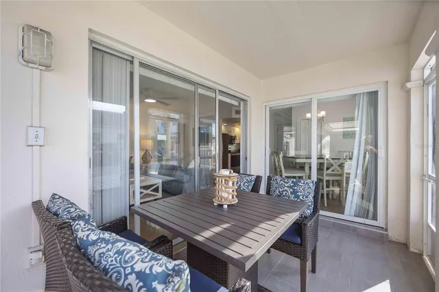 a kitchen with white cabinets and white stainless steel appliances