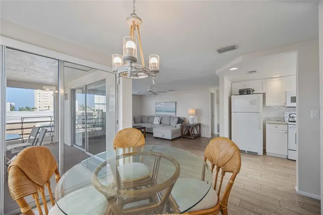 a kitchen with a sink cabinets and window