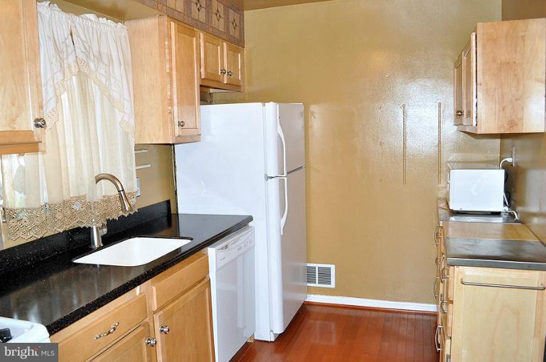 6106 Addison Road Capitol Heights, MD 20743 - Photo 20 of 25 maple hardwood floors
