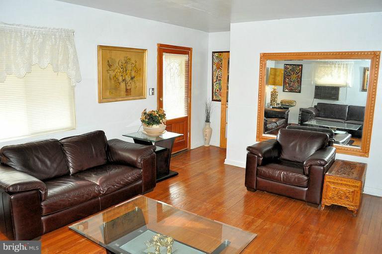 6106 Addison Road Capitol Heights, MD 20743 - Photo 8 of 25 large wood mirror matches wood trim