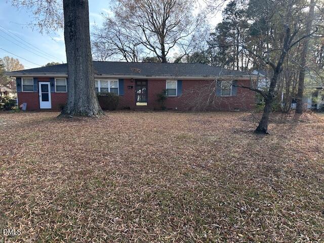 601 Fairfield Road Durham, NC 27704 - Photo 17 of 20 a view of a house with a yard and garage